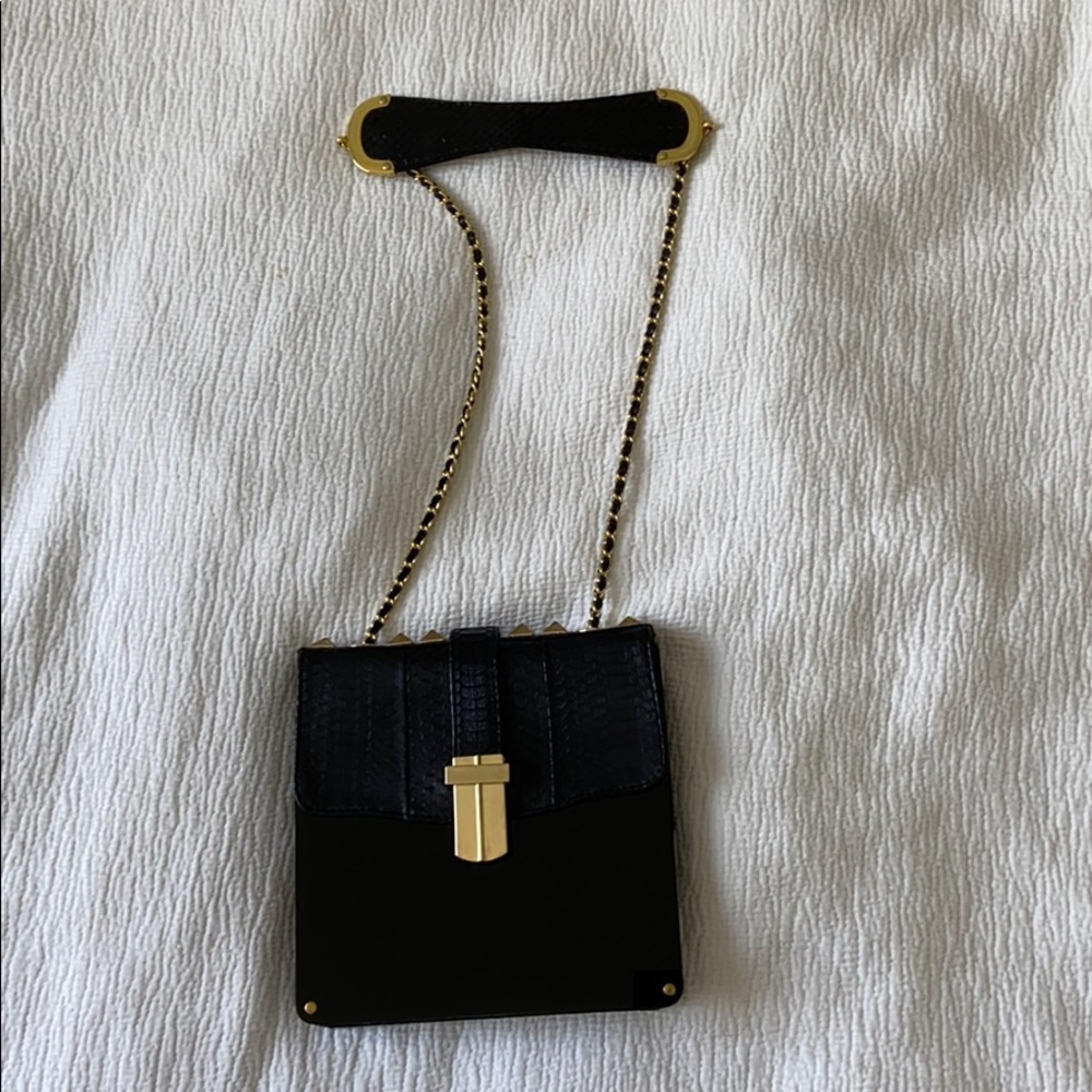 Angel Jackson black studded purse perch skin